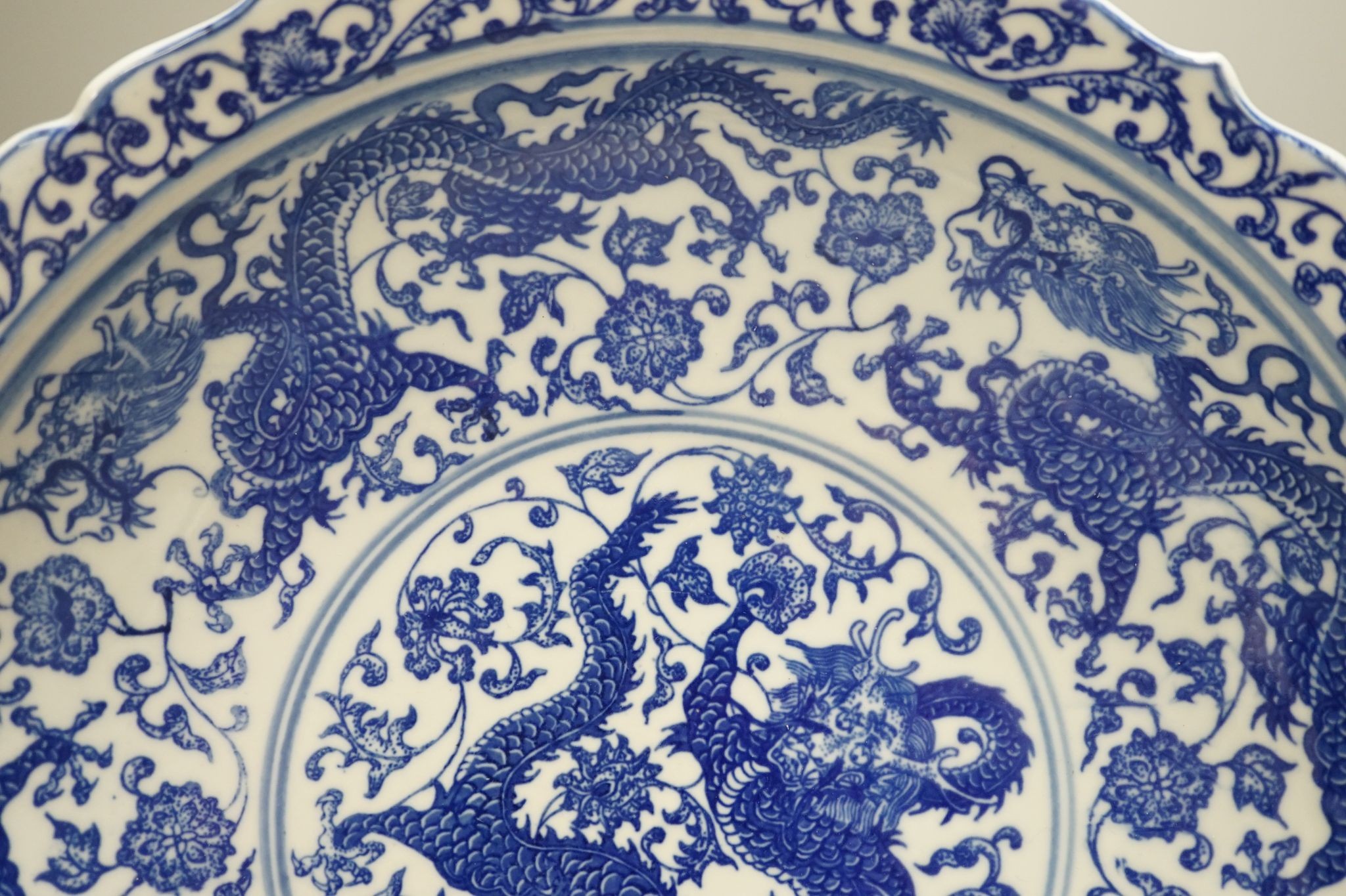 A Chinese blue and white ‘dragon’ dish 31cm